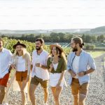 a group of people enjoying winery tours