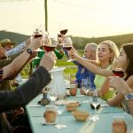 Wine tasting private tour raising glasses in celebratory toast